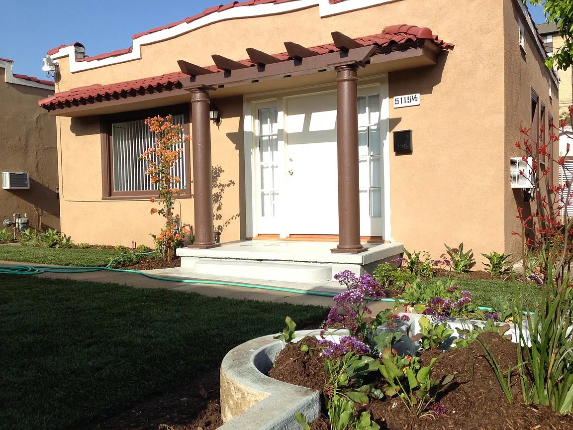 Covered front porch entry of a Hollywood Bungalows residence